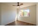 Bright bedroom featuring hardwood floors and a ceiling fan at 6425 N 79Th St, Scottsdale, AZ 85250