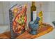 Kitchen detail showing cookbook, mortar and pestle, and olive oil at 6425 N 79Th St, Scottsdale, AZ 85250