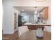 Modern kitchen with white quartz counters and light wood cabinets at 6425 N 79Th St, Scottsdale, AZ 85250