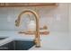 Modern kitchen sink and gold faucet detail at 6425 N 79Th St, Scottsdale, AZ 85250