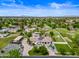 Aerial view of house, expansive backyard, and surrounding landscape at 715 S Cactus Wren St, Gilbert, AZ 85296