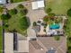 Aerial view of the backyard, highlighting the pool, a maze-like garden, and outdoor structures at 715 S Cactus Wren St, Gilbert, AZ 85296