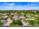 Aerial view of house, expansive backyard, and surrounding landscape at 715 S Cactus Wren St, Gilbert, AZ 85296