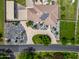 Aerial view showing a home's exterior with a circular driveway and landscaped front yard at 715 S Cactus Wren St, Gilbert, AZ 85296