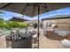 Large backyard with covered patio, pool, and outdoor kitchen at 715 S Cactus Wren St, Gilbert, AZ 85296