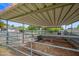 Covered area with several animal stalls at 715 S Cactus Wren St, Gilbert, AZ 85296