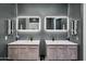 Double vanity bathroom with modern sinks and mirrors at 715 S Cactus Wren St, Gilbert, AZ 85296