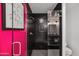 Modern bathroom with black tile shower and white vanity at 715 S Cactus Wren St, Gilbert, AZ 85296