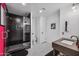 Modern bathroom with black tile shower and floating vanity at 715 S Cactus Wren St, Gilbert, AZ 85296