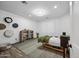 Bright bedroom with a bed, rug and decorative shelves at 715 S Cactus Wren St, Gilbert, AZ 85296