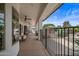 Covered patio with seating area and access to backyard and pool at 715 S Cactus Wren St, Gilbert, AZ 85296