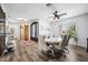 Dining area with round table, white chairs, and built-in shelving at 715 S Cactus Wren St, Gilbert, AZ 85296