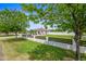 Landscaped front yard with a modern house and a fence at 715 S Cactus Wren St, Gilbert, AZ 85296