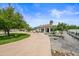 Landscaped front yard with a modern house and a circular driveway at 715 S Cactus Wren St, Gilbert, AZ 85296