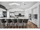 Modern kitchen with white cabinets and a large island at 715 S Cactus Wren St, Gilbert, AZ 85296