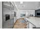 Bright kitchen featuring stainless steel appliances and hardwood floors at 715 S Cactus Wren St, Gilbert, AZ 85296