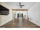 Bright and airy living room with hardwood floors and large windows at 715 S Cactus Wren St, Gilbert, AZ 85296