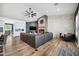 Spacious living room with a modern fireplace and hardwood floors at 715 S Cactus Wren St, Gilbert, AZ 85296