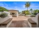 Outdoor kitchen and dining area with stone patio at 715 S Cactus Wren St, Gilbert, AZ 85296