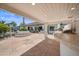 Covered outdoor kitchen with stone countertops at 715 S Cactus Wren St, Gilbert, AZ 85296