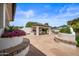 Covered outdoor kitchen with built-in grill and seating at 715 S Cactus Wren St, Gilbert, AZ 85296