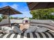 Relaxing patio with fireplace and seating area, perfect for outdoor entertaining at 715 S Cactus Wren St, Gilbert, AZ 85296