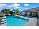 Relaxing pool area with tiled steps and surrounding landscaping at 715 S Cactus Wren St, Gilbert, AZ 85296