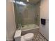 Modern bathroom with herringbone tile and glass shower at 7249 N Central Ave, Phoenix, AZ 85020