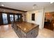 Large kitchen island, custom cabinetry, and high-end appliances at 7249 N Central Ave, Phoenix, AZ 85020