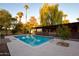 Inviting swimming pool with surrounding landscaping at 7249 N Central Ave, Phoenix, AZ 85020