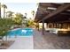 Inviting pool area with pergola, lounge furniture, and brick patio at 7249 N Central Ave, Phoenix, AZ 85020