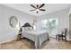 Cozy bedroom with ceiling fan and window coverings at 7272 E Gainey Ranch Rd # 74, Scottsdale, AZ 85258