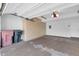 Attached garage with overhead storage cabinets at 7272 E Gainey Ranch Rd # 74, Scottsdale, AZ 85258