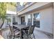 Outdoor patio with seating area and decorative rug at 7272 E Gainey Ranch Rd # 74, Scottsdale, AZ 85258