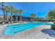 Resort-style pool with plenty of lounge chairs at 7272 E Gainey Ranch Rd # 74, Scottsdale, AZ 85258