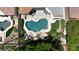 Aerial view of unique shaped pool and surrounding landscape at 7347 E Turquoise Ave, Scottsdale, AZ 85258