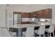 Modern kitchen with stainless steel appliances and granite countertops at 7347 E Turquoise Ave, Scottsdale, AZ 85258