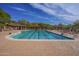 Relaxing community pool with lap lanes and ample lounge chairs at 7445 E Eagle Crest Dr # 1065, Mesa, AZ 85207