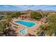 Resort-style pool with lap lanes, spa, and comfortable lounge areas at 7445 E Eagle Crest Dr # 1065, Mesa, AZ 85207