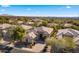 Aerial view showcasing a single-Gathering home with mountain views at 7691 E Fledgling Dr, Scottsdale, AZ 85255