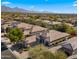 Aerial view of a luxury community nestled against a mountain backdrop at 7691 E Fledgling Dr, Scottsdale, AZ 85255