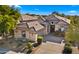 Beautiful single-story home with tile roof and desert landscaping at 7691 E Fledgling Dr, Scottsdale, AZ 85255