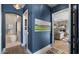 Transitional hallway connecting the bathroom and living room at 7691 E Fledgling Dr, Scottsdale, AZ 85255