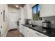 Laundry room with modern appliances and ample counter space at 7691 E Fledgling Dr, Scottsdale, AZ 85255