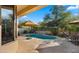 Relaxing pool area with patio and umbrella at 7691 E Fledgling Dr, Scottsdale, AZ 85255