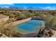 Enjoy resort-style living with this community tennis court, complete with a net and lights at 7691 E Fledgling Dr, Scottsdale, AZ 85255