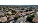 Aerial view of a residential neighborhood showcasing homes with pools and lush landscaping at 7893 S Stephanie Ln, Tempe, AZ 85284