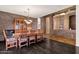 Formal dining room with wood table and stone accents at 7893 S Stephanie Ln, Tempe, AZ 85284