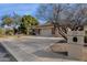 Brick home with a three car garage and a mailbox at 7893 S Stephanie Ln, Tempe, AZ 85284