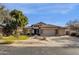 Single-story home with three-car garage and manicured lawn at 7893 S Stephanie Ln, Tempe, AZ 85284